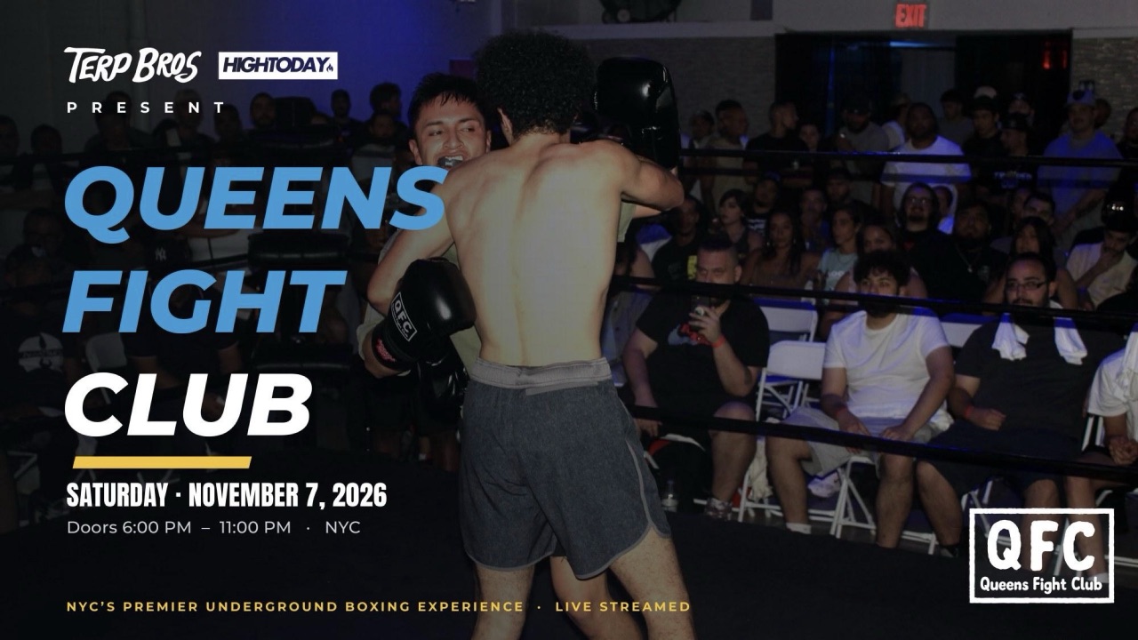 Two boxers in the clinch in front of a packed crowd at a Queens Fight Club night, with the November 7, 2026 event title